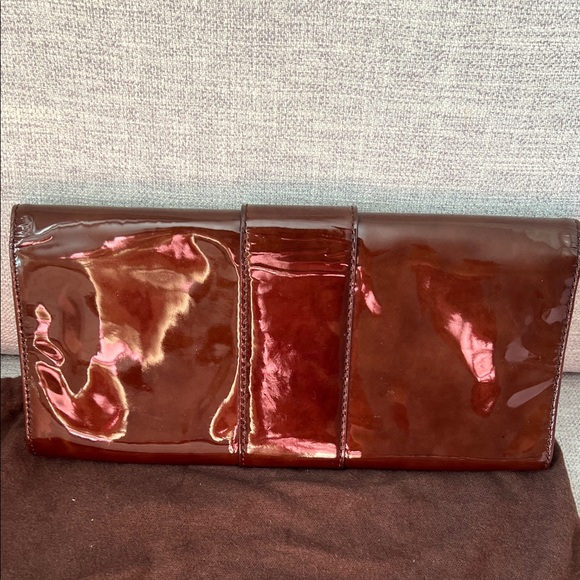 Michael Kors Glossy Brown clutch with Gold Accent - Picture 3 of 9